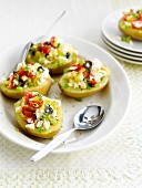 Jacket potatoes with tomatoes and feta