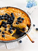 Blueberry and almond polenta pudding