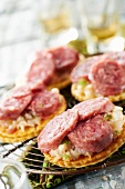 Sausage and scallop tartlets