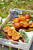 Toasted brioche slices with apricot skewers