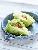 Cabbage leaves stuffed with chicken and raisins