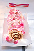 Pink rose Christmas log cake