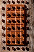 Coffee beans on squares of chocolate