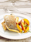 Grilled sea bream with roasted peaches