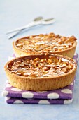 Toffee and thinly sliced almond tartlets