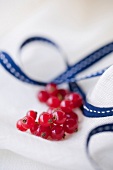 Bunch of redcurrants,tablecloth and ribbon
