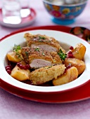 Breaded turkey escalope, roasted potatoes with cranberries