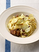 Tagliatelles with chestnuts, mushrooms, fresh ginger and combava zests