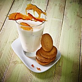 Glass of caramel milk and shortbread cookies