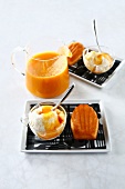 Vanilla ice cream with peach coulis and Madeleines