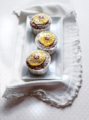 Schoko-Cupcakes mit Mango-Glasur