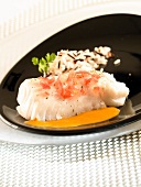 Piece of steamed cod with crushed tomatoes