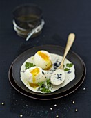 Soft-boiled egg in caviar cream