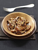 Filet mignon and shiitake fricassée in caramel and sesame seed sauce