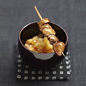 Chicken liver Yakitori with rice syrup sauce and potatoes sauteed with saké