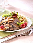 Veal's liver with raspberry vinaigar sauce,quinoa and mesclun warm salad