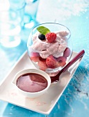 Blueberry mousse and fresh raspberries, blackcurrant coulis