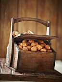 Wooden box of walnuts