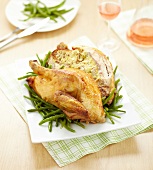 Roasted chicken stuffed with bread and mushrooms