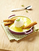 Curry-flavored cream of fennel and potato soup, fennel ice cream and gingerbread fingers