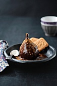 Poached pear with melted chocolate