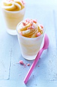 Orange ice cream topped with crushed Roses de Reims biscuits