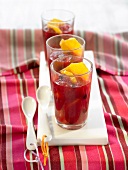 Fresh fruit in hibiscus syrup