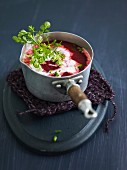 Cream of beetroot soup with herbs