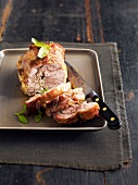 Rolled shoulder of lamb with herbs