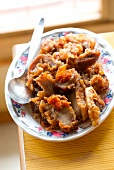 Chinese-style crispy and caramelized pork Mignon with chili pepper paste