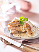 Turkey escalope in creamy mustard and goat's cheese sauce