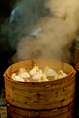 Steaming dumplings in a street in China
