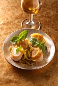 Scallops marinated in Cognac with basil and lemon zests