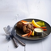 Knuckle of veal, creamy sauce and steamed vegetables