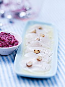 Hazelnut-flavored scallop carpaccio with creamed red chicory