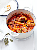 Beef simmered with carrots,cinnamon and tomato sauce