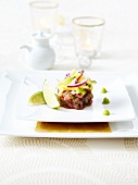 Small red tuna tartare with kwi, pineapple, red onions and lime juice