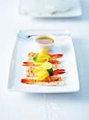 Tropical shrimp carpaccio with mint and thinly sliced mango