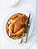 Roast chicken in coarse salt crust and autumn vegetables with thyme