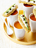 Lobster bisque,sesame crackers garnished with cream and lumpfish roe