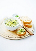 Potted zucchinis with lime and mint on sliced bread