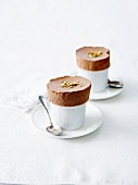 Chocolate souffle topped with crushed pistachios