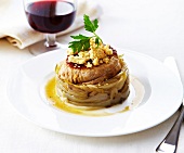 Braised chicory topped with crumble-style veal Grenadin