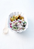 Mackerels in creamy sauce with potato salad