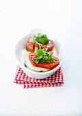 Oven-baked Sainte-Maure cheese with fresh tomatoes