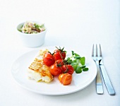 Pan-fried cod fillet with cherry tomatoes and olive oil
