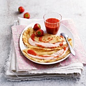 Pancakes with strawberry mousse and coulis