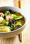 Pork, zucchini, black mushroom and soya noodle soup