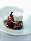 Marinated dates with coffee and orange and a scoop of vanilla ice cream