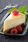 Slices of cheesecake with raspberries